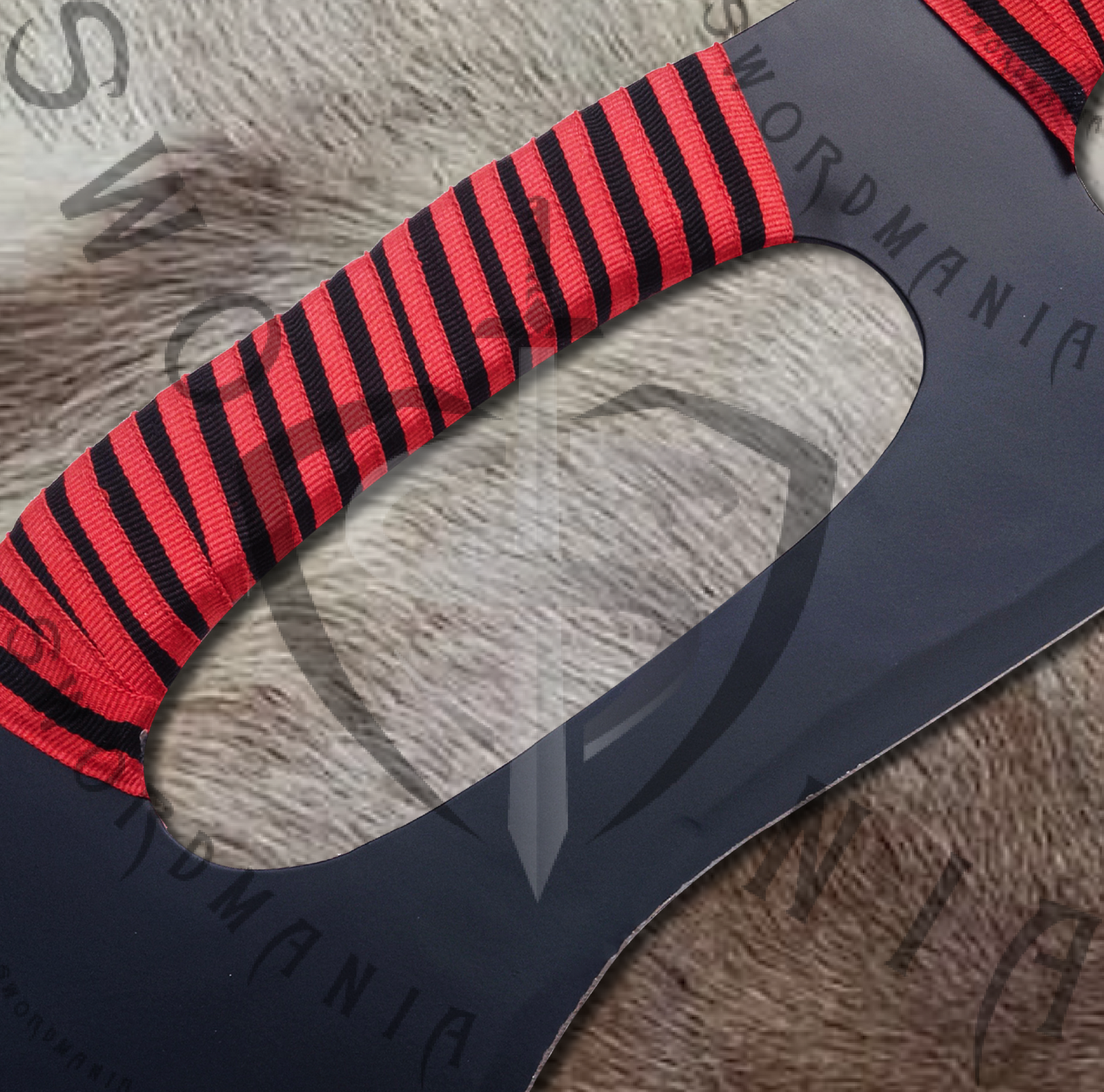 the handholds are used to hold klingon sword easily and also to to twirl and spin the blade rapidly.