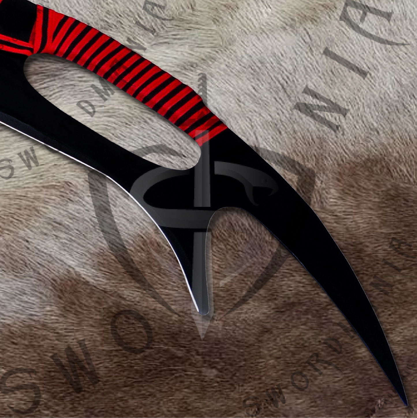 The blade of Klingon Bat'leth Sword of Klingons has curved blade, four points, and three handholds on the back the handholds are used to twirl and spin the blade rapidly.
