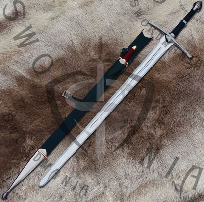 Strider replica sword of Aragorn is handmade, hand forged full tang 45in full scale sword with a high polish finished blade that is edged and for its safety during carriage and cosplay, we offer a free complimentary wooden scabbard stitched with pure leather and further adorned by the casted fittings knife. to perfectly couple the high quality manufacturing of the sword of aragorn by expert swordsmiths at SWORDMANIA