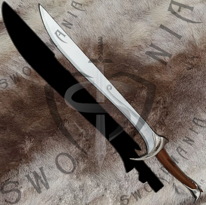 Orcrist replica sword is handmade, hand forged full tang 39in full scale sword with a high polish finished blade that is edged and for its safety during carriage and cosplay, we offer a free complimentary stitched sheath with pure leather to perfectly couple the high quality manufacturing of the sword of Thorin Okenshield, by expert swordsmiths at SWORDMANIA