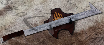 Uruk-Hai Sword has silk screen printed plaque and sheath that has hand stitched black leather on it, further adorned by embossing.